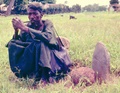 priest_with_standing_stone.jpg
